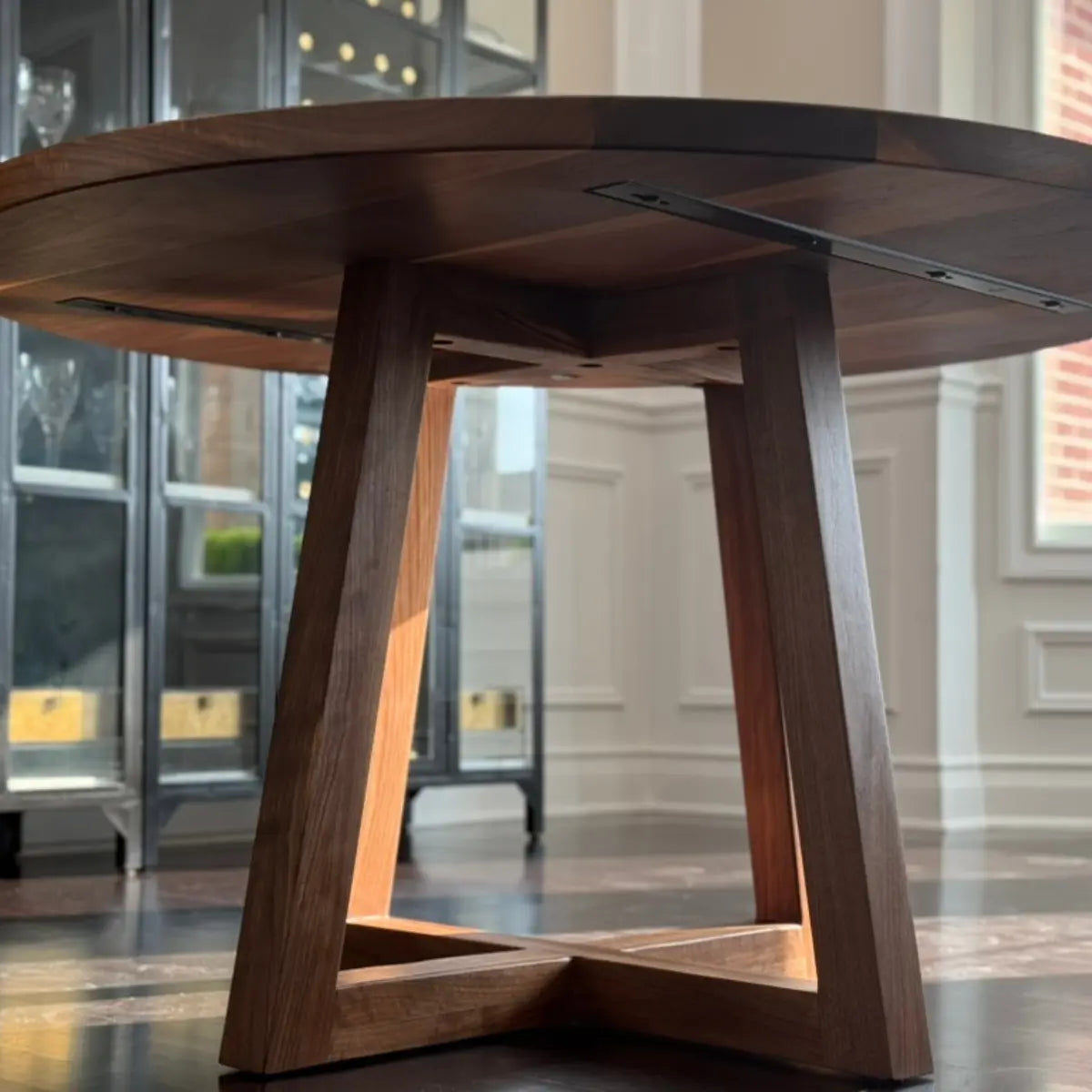 Wooden dining table with a modern design in an indoor setting